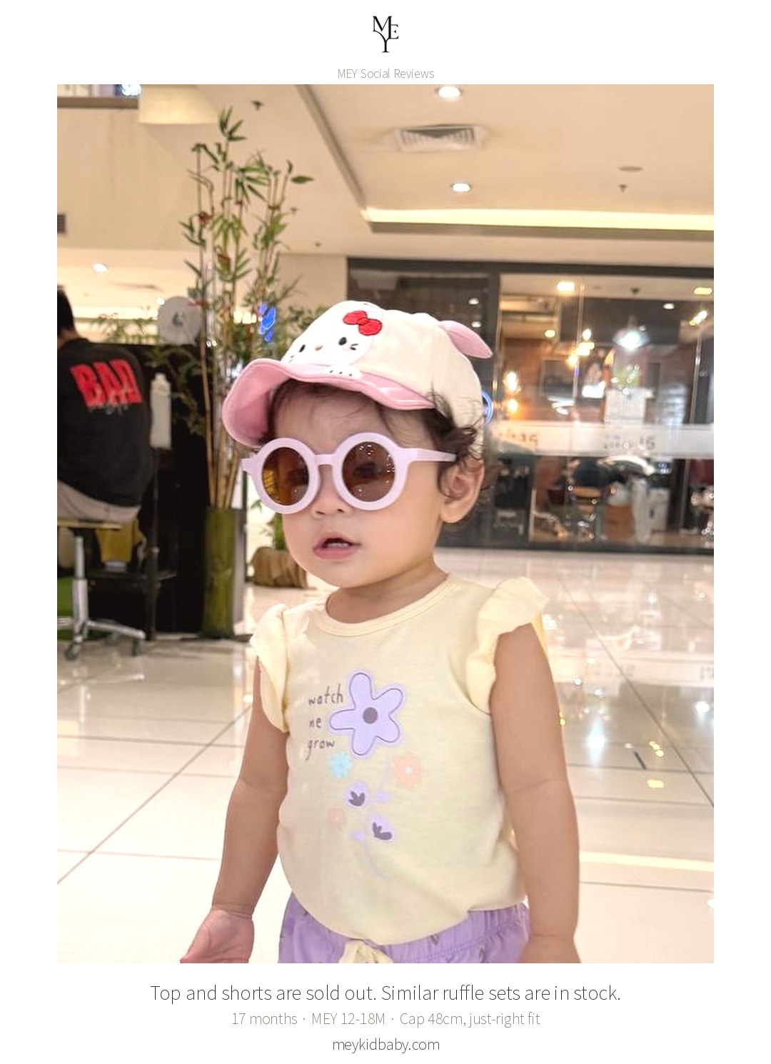 A 17-month-old wearing the MEY character cap during a mall afternoon 7